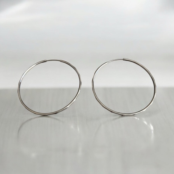 Thin Rhodium Electroplated Hoop Earrings - Picture 2 of 5